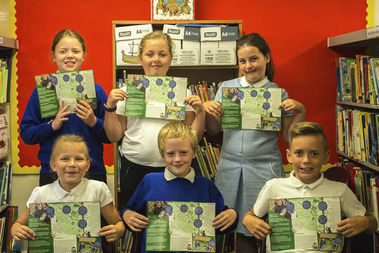 Bincombe Pupils holding leaflet